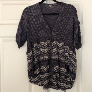 Blue blouse with some white detail